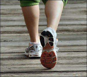 Losing weight is recommended to avoid fatty liver disease. Picture of jogger